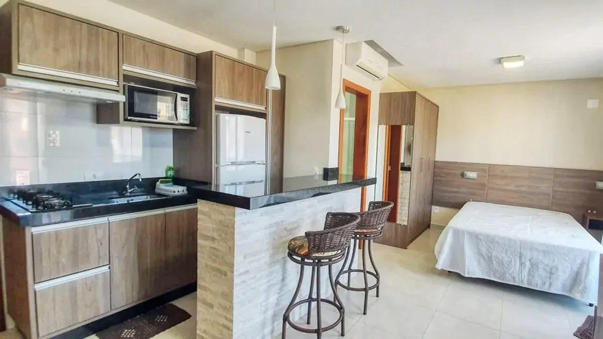 Loft 202 com cama de casal em ambiente integrado