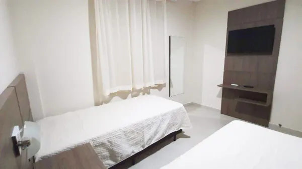 Cozinha completa da Cobertura 301 com cooktop e utensílios